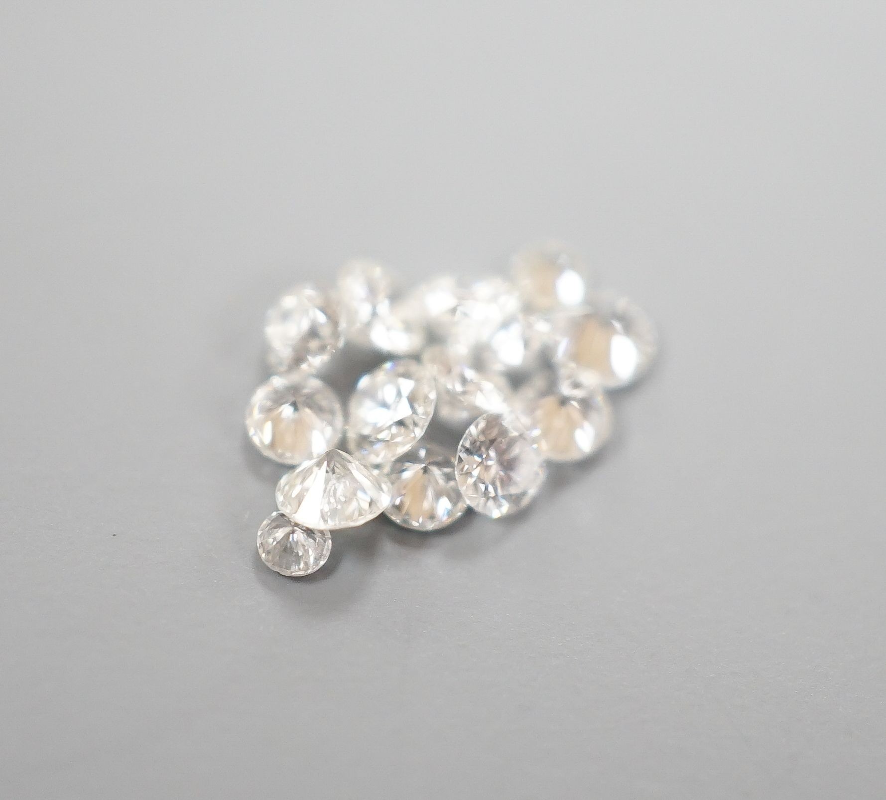 Fourteen small unmounted cut diamonds, total weight approx. 0.58ct.